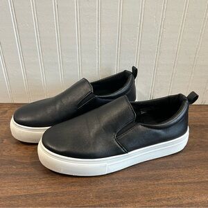 Black slip on sneakers